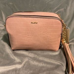 Pink crocodile pattern purse